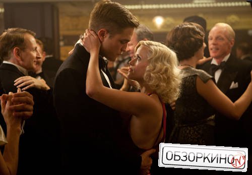 Robert Pattinson и Reese Witherspoon в фильме Воды слонам (Water for Elephants)